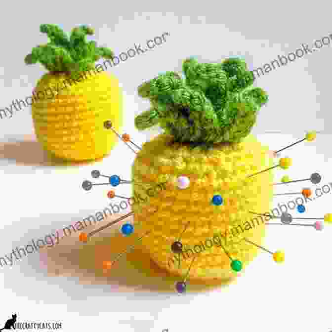 A Pineapple Pincushion Made Of Yellow Fabric With A Green Crown And Leaves. Super Cute Pincushions: 35 Adorable Pincushions All Stitchers Will Love