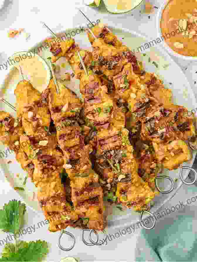 Grilled Satay Padang Skewers Adorned With A Vibrant Yellow Sauce, Exuding An Aromatic Blend Of Spices And Grilled Meat. Flavors Of The Southeast Asian Grill: Classic Recipes For Seafood And Meats Cooked Over Charcoal A Cookbook