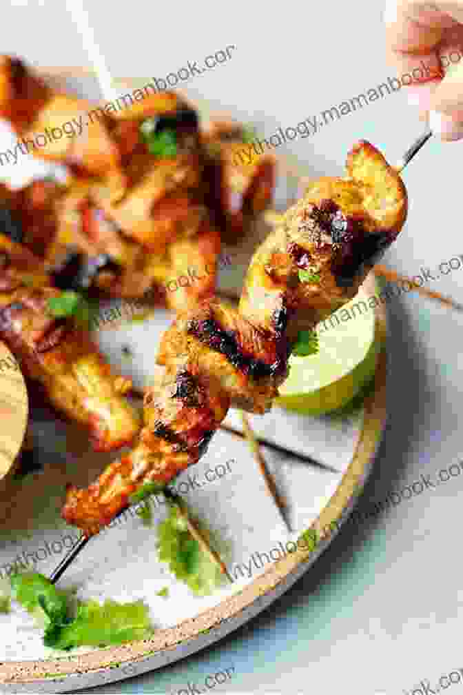 Grilled Satay Skewers Sizzling Over A Charcoal Grill, Exuding An Aromatic Blend Of Spices And Grilled Meat. Flavors Of The Southeast Asian Grill: Classic Recipes For Seafood And Meats Cooked Over Charcoal A Cookbook