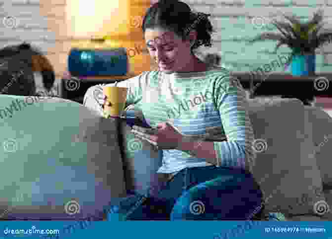 Young Woman Using Instagram On Her Smartphone While Sitting On A Couch In Her Living Room, Smiling And Looking Engaged With The Content. Earn Income From Instagram: Social Media Hacks